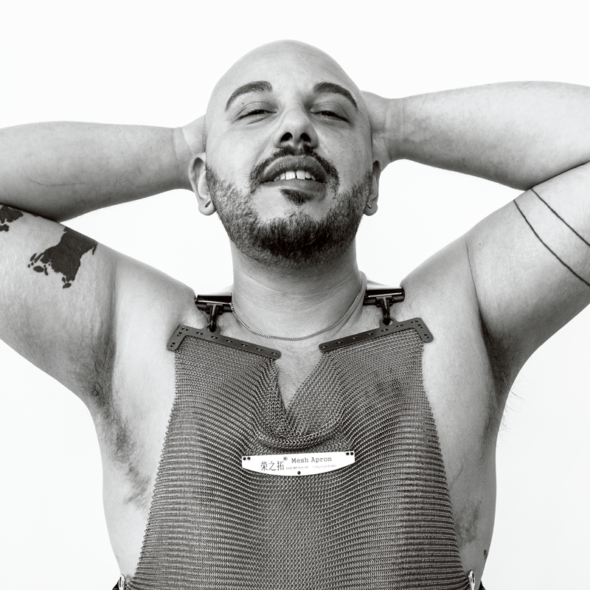 DSC_0302v2_color_QUAD_LP-vignette-CROP a black and white portrait of butcher stefano diaz