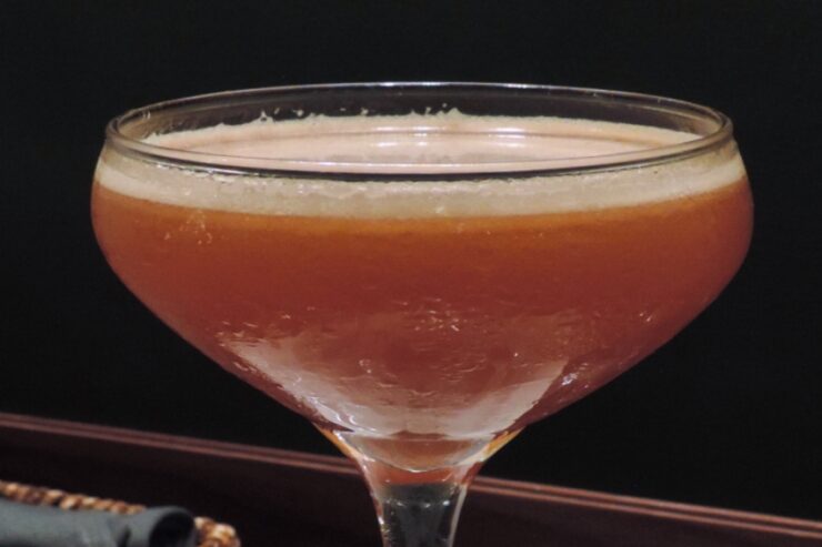 bourbon cocktail in a coupe glass