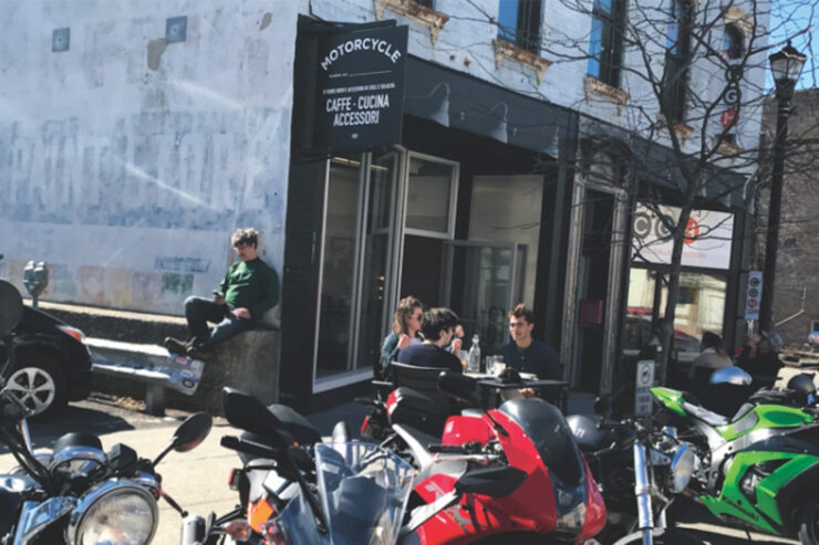 Profile of Moto Coffee Machine with various colored motorcycles parked in front.