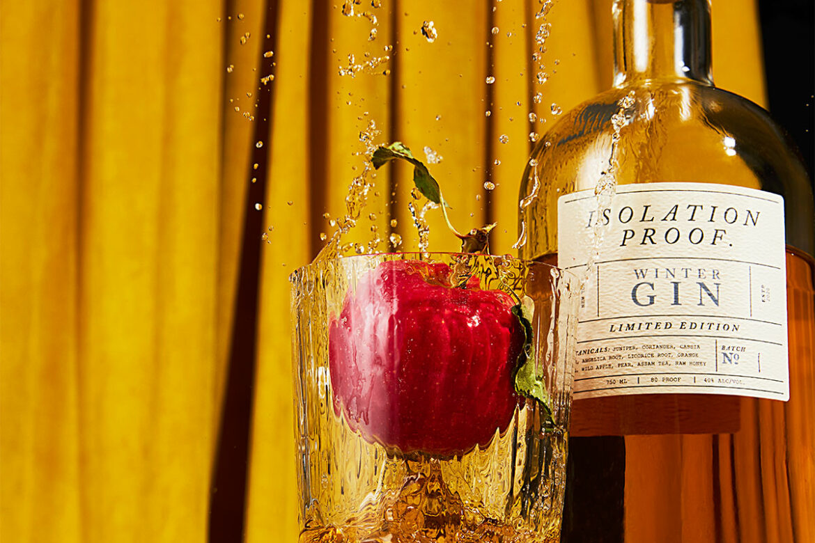 apple splashing into isolation proof gin